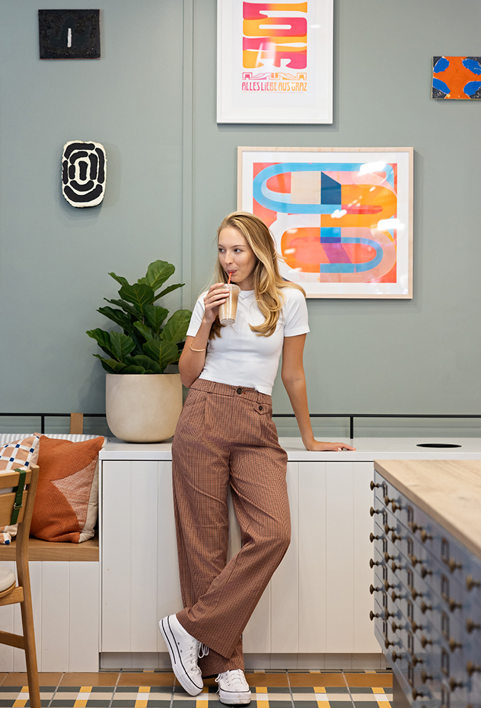 A woman sipping coffee